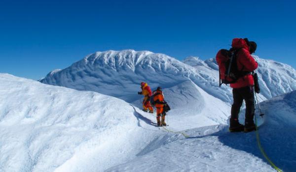 Route finding through snow rime 'mushrooms' on Mount Sidley's summit ridge.