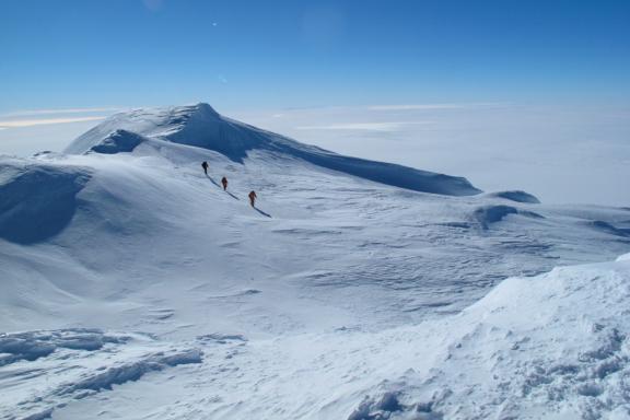 Climbing team begins the descent from the summit of Mount Sidley
