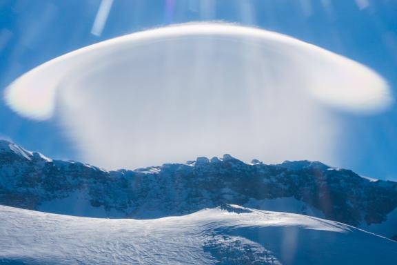 Lenticular cloud above the rim of Mount Sidley's caldera